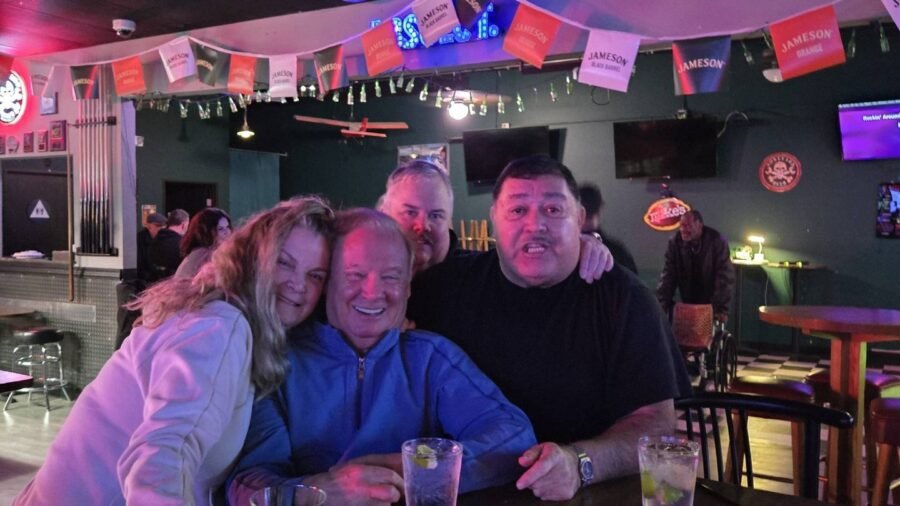Two customers at the bar at Christmas